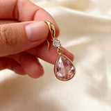 Classic drop earrings with a pink crystal