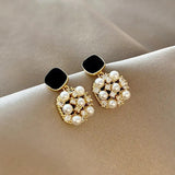 Golden black opal stud earrings