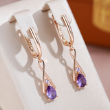 Gold-plated pendants made of violet zircon