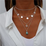 Silver necklace with blue stone