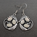 White crystals and vintage silver earrings
