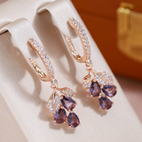 Elegant gold-plated earrings with garnet crystals