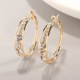Elegant earrings with a gold finish