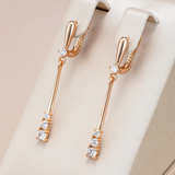 Elegant earrings with golden zircon