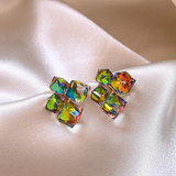 Multi-coloured zirconia earrings in elegant golden shades