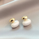 Oval earrings with gold pendants