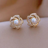 Elegant spiral pearl earrings