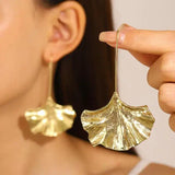 Vintage earrings with golden blooms