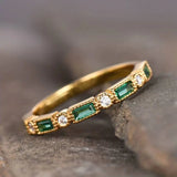 Golden vintage ring with green zircon