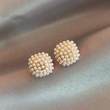 Elegant with Gold Earrings Featuring Inset Pearls