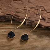 Vintage earrings in gold and black