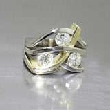 Vintage ring with zircon in gold and silver