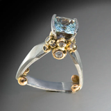 Vintage gold and silver ring with blue zircon
