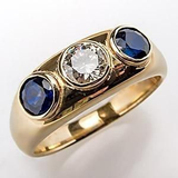 Ring with zircon and blue crystal