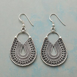 Vintage silver earrings with a mandala pendant