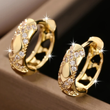 Golden open hoop earrings with sparkling finish