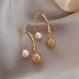 Vintage earrings with gold and pearls