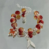 Silver autumn leaf and butterfly