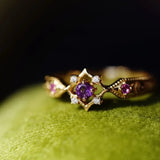 Adjustable geometric vintage ring with golden and purple amethyst