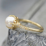 Vintage ring with a golden pearl in the middle