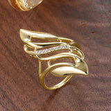 Golden vintage ring with twisted leaf