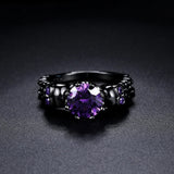 Vintage Black Round Ring with Purple Jewel and Intricate Design