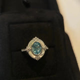Timelessly adjustable ring in white silver and aquamarine