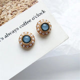 Vintage earrings with blue stones and golden beads