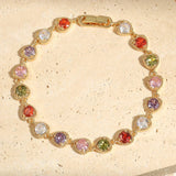 Golden vintage bracelet with heart, love and rainbow