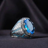 Handmade vintage ring in silver and blue stone