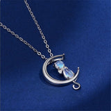 A Companion necklace, the pendant is a half moon and cat-shaped moon stone