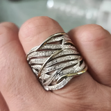 Elegant ring with multiple intertwining layers